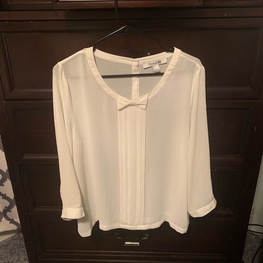 Barely worn white blouse with bow